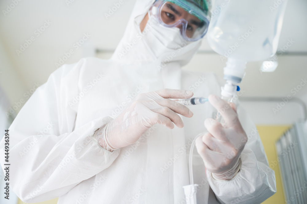 scientist doctor ppe suit and goggles and mask to corona virus covid-19 disease protection, working about health pandemic medicine in quarantine hospital laboratory with outbreak prevention scientist doctor ppe suit and goggles and mask to corona virus covid-19 disease protection, working about health pandemic medicine in quarantine hospital laboratory with outbreak prevention