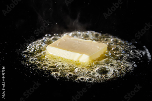 фотографія Butter frying on hot pan for cooking dish
