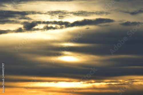 Fototapeta Naklejka Na Ścianę i Meble -  clouds against the setting sun