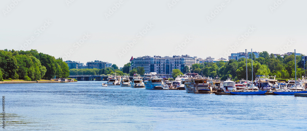 Panoramic summer cityscape, yacht club in the Krestovsky Island and residential areas in Saint Petersburg, Russia