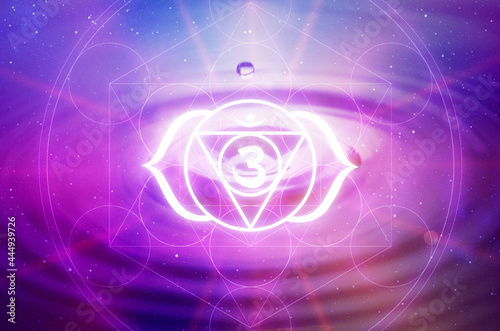 Ajna Chakra symbol on a purple background. This is the sixth Chakra, also called The Third Eye Chakra