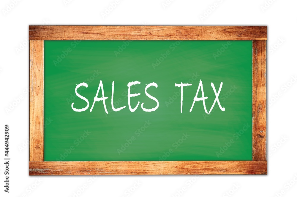 SALES TAX text written on green school board. SALES TAX text written on green school board.