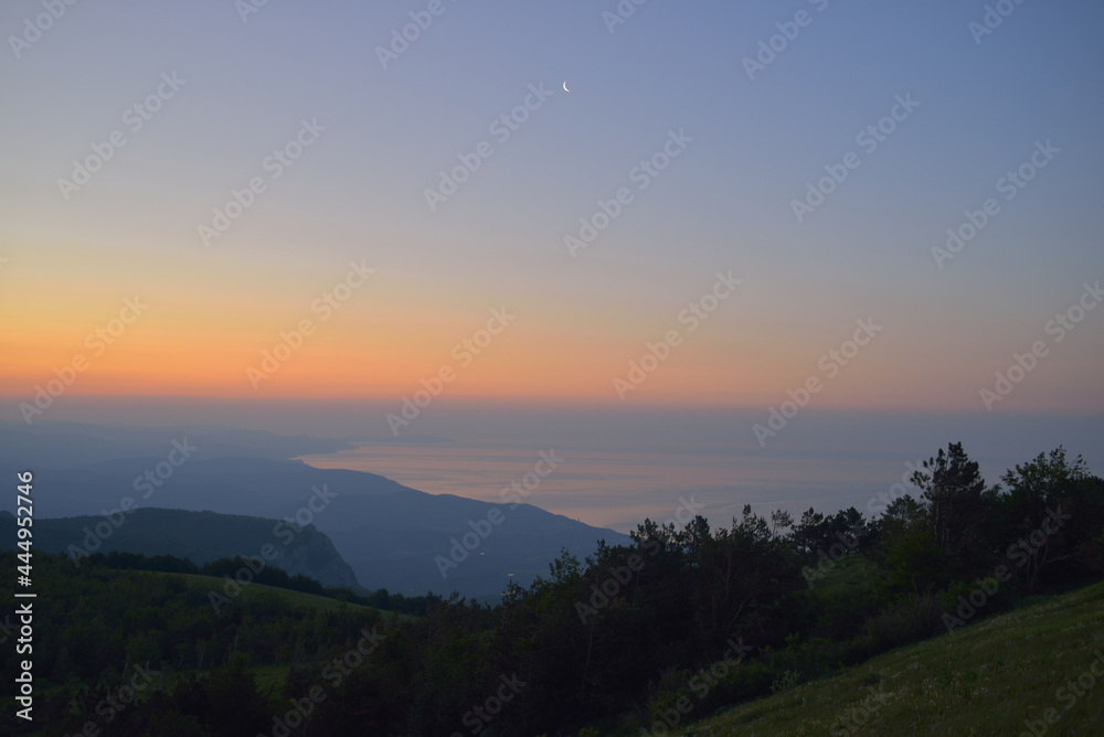 Twilight over southern coast of Crimea and Black Sea from Crimean Mountains