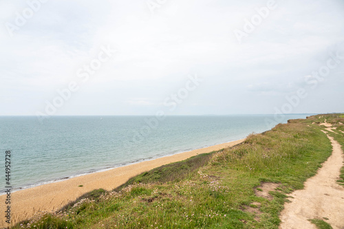 footpath overlooking a beautiful empty English beach