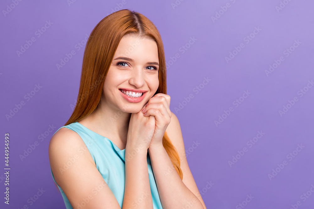 Photo of young attractive girl happy positive smile hands touch chin foxy isolated over purple color background Photo of young attractive girl happy positive smile hands touch chin foxy isolated over purple color background