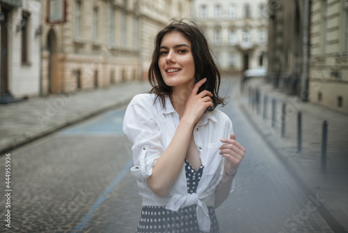 Pretty european girl dressed in summer clothes photo