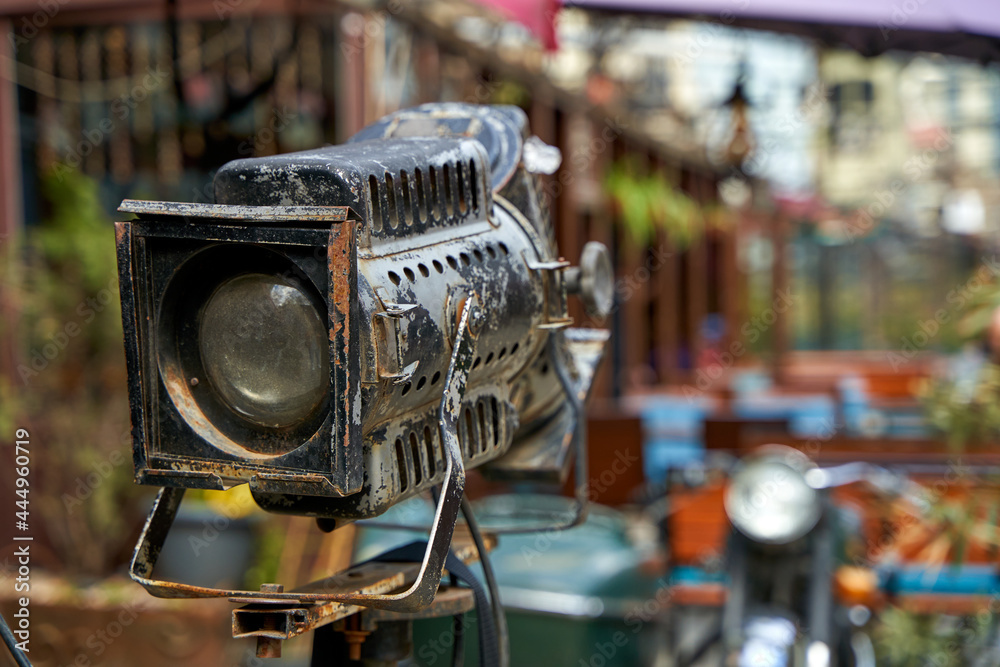 Fototapeta premium Street cafe exterior details. Vintage spotlight for lighting