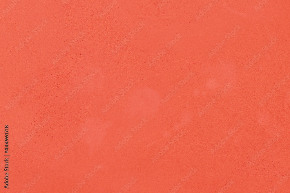 Background or wall surface decorated with dark pastel orange for design.