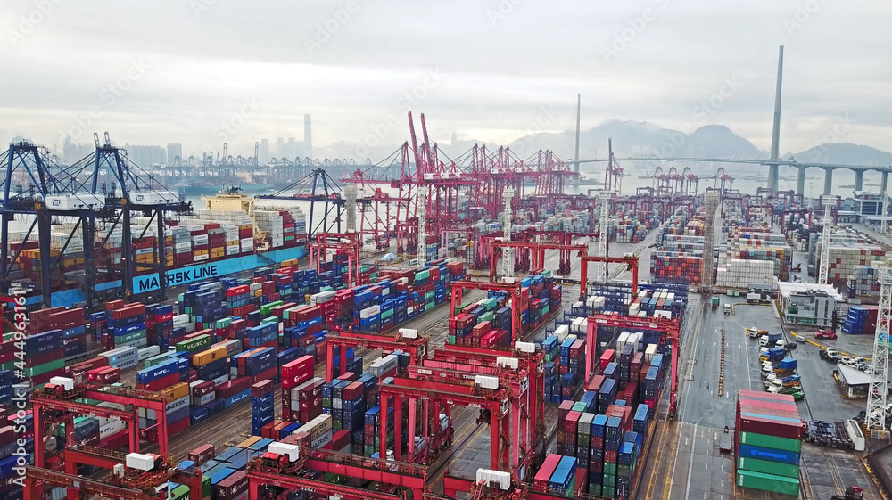 HONG KONG. February 20. Aerial view of huge industrial port with containers and huge ship.