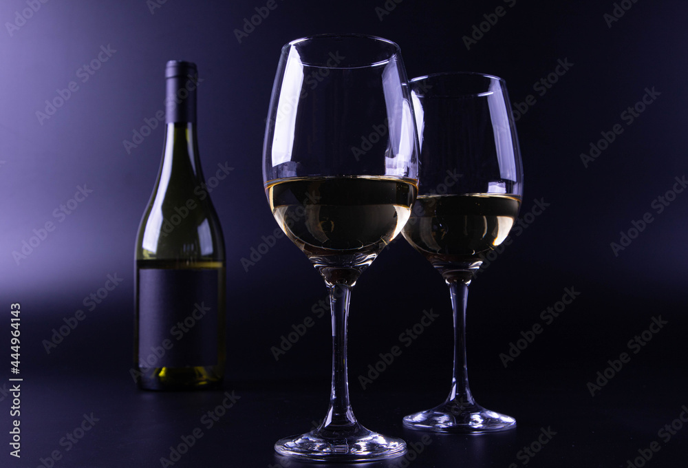 wine glass with bottle and black background wine glass with bottle and black background