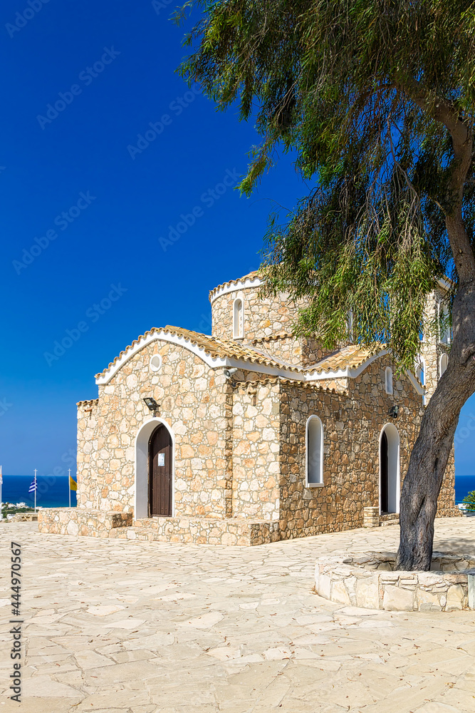 Cyprus, Protaras - 22 June 2021. Church of Saint Elias (Ayios Ilias,  Profitis Elias). An ancient 14th-century Orthodox church on top of a small mountain, overlooking the whole village.