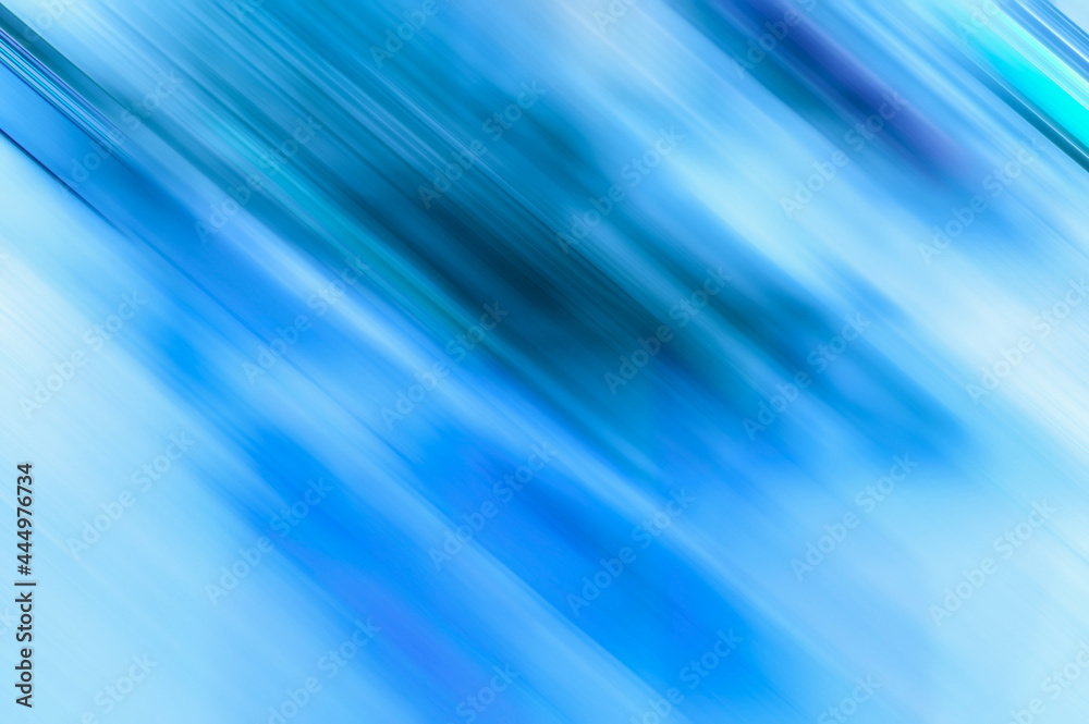 Gradient blue blurry diagonal lines motion blur background Gradient blue blurry diagonal lines motion blur background
