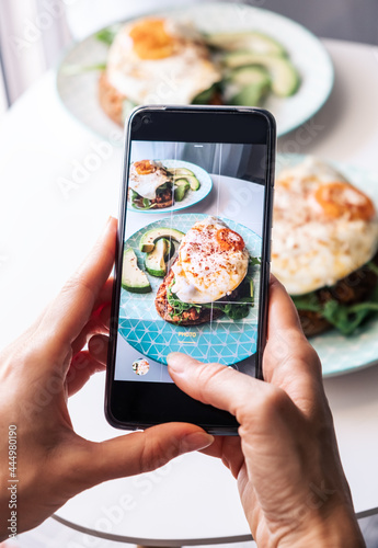 Taking photo of the food for social networks.
