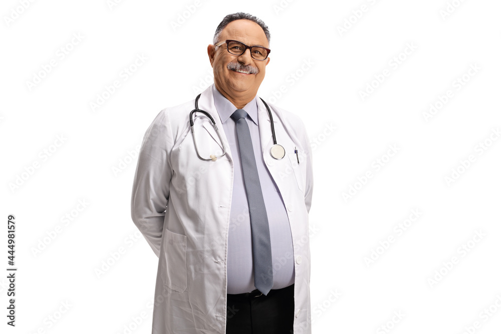 Mature male doctor standing and smiling