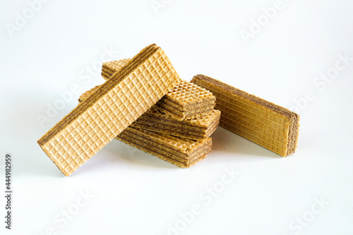 Wafers with chocolate on white background. food health.