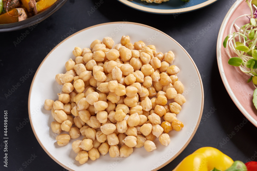 Vegetarian Buddha bowl with fresh vegetable salad and chickpea. Vegetarian and vegan food concept. Healthy eating. Vegetarian Buddha bowl with fresh vegetable salad and chickpea. Vegetarian and vegan food concept. Healthy eating.