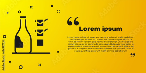 Black Bottle of wine icon isolated on yellow background. Vector
