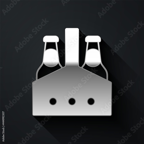 Silver Pack of beer bottles icon isolated on black background. Case crate beer box sign. Long shadow style. Vector