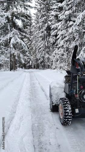 snow removal with a snow blower tractor