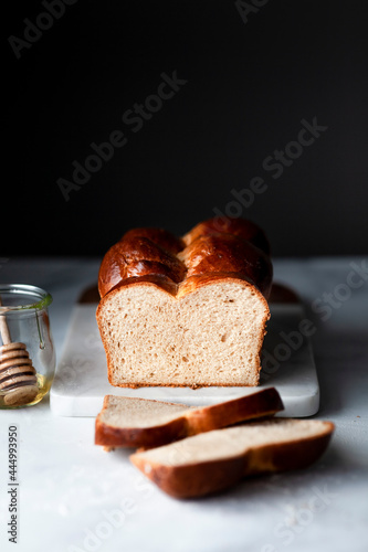 A loaf of sliced brioche bread photo