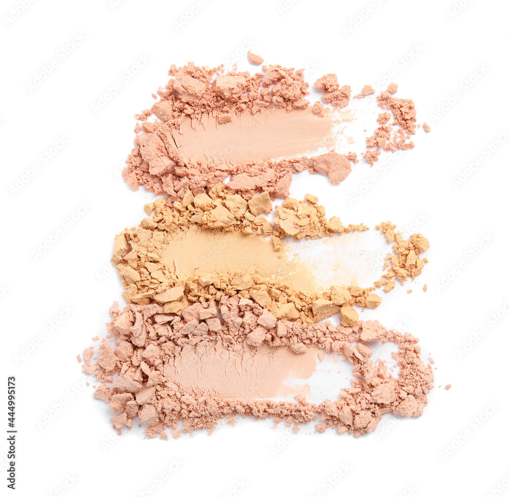 Swatches of different crushed face powders on white background, top view Swatches of different crushed face powders on white background, top view