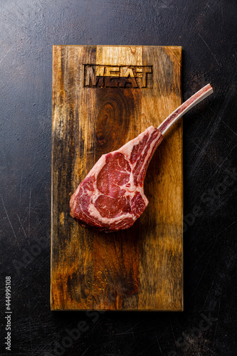 Raw Tomahawk Steak photo