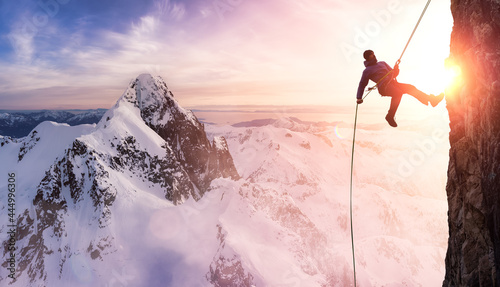 Fényképezés Epic Adventurous Extreme Sport Composite of Rock Climbing Man Rappelling from a Cliff