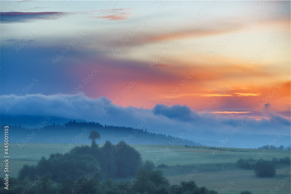 Naklejka premium sunrise in the mountains
