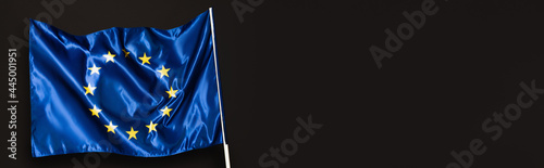 blue european union flag isolated on black, banner