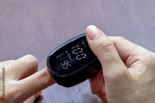 Digital finger pulse oximeter for measuring pulse rate and oxygen saturation levels in blood, Medical equipment.