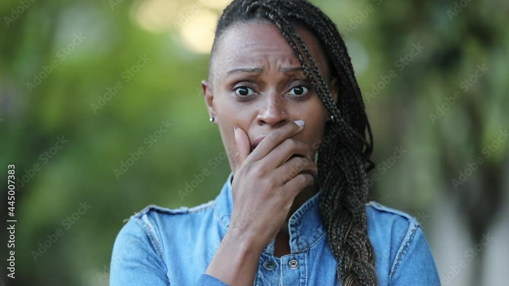Woman regret emotion, African ethnicity person in disappointment Woman regret emotion, African ethnicity person in disappointment