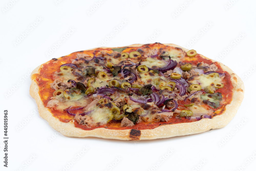 High angle studio shot of freshly baked pizza al tonno isolated on white background. Tuna, olives, onions, veggies, crust, tomato sauce.