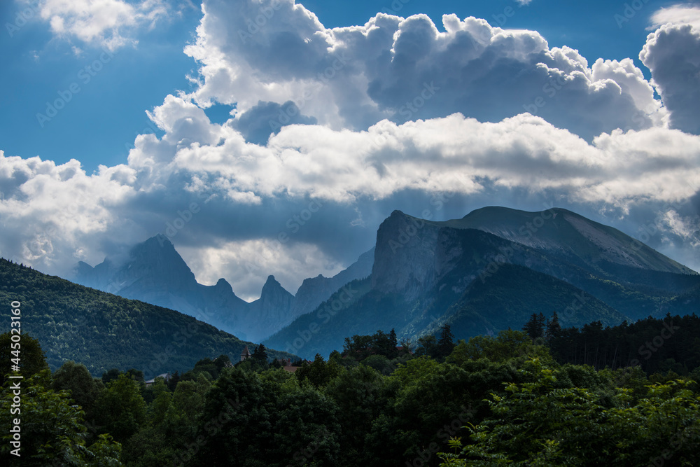 Mountain scenery under the cloudy blue sky