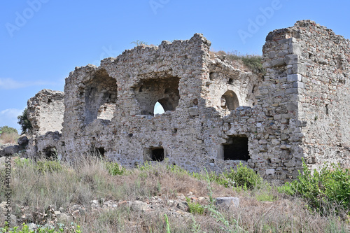 Side view of an abandoned two-story building of an ancient Roman hospital