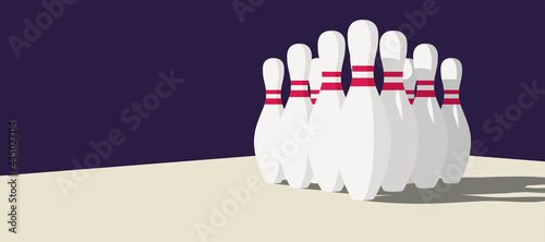 skittles and bowling ball standing on bowling floor