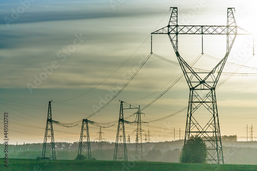 Industrial high voltage electricity line tower. Energy technology photo