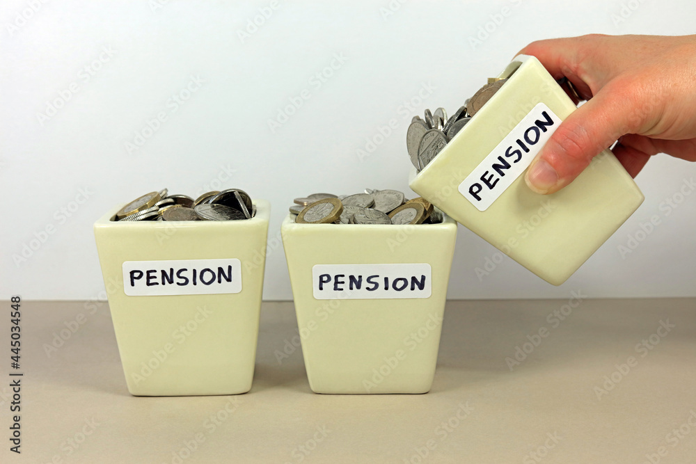 A Hand Tipping A Pension Pot In To Another. Consolidating Multiple Pensions Concept - obrazy, fototapety, plakaty 