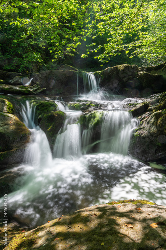 Long exposure of a waterfall on the Hoar Oak Water river at Watersmeet in Exmoor National Park