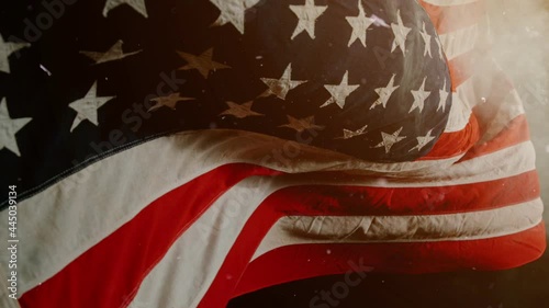 Close up of American Flag Waving. USA Banner Flaping in Wind. Concept of 4th of July, Independence Day, American Election and Other Feasts photo