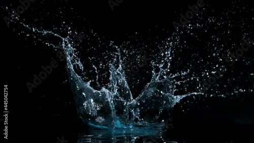 Super slow motion of water splash on black background. Filmed on high speed cinema camera, 1000 fps.