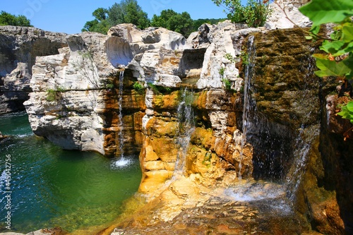 waterfall in the mountains photo