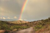 A beautiful rainbow over the desert landscape, scenic forest road 618, in the Coconino National Forest, Yavapai County, Arizona.