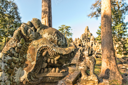 Lion statue in Angkor Wat, Cambodia © ZHISHAO