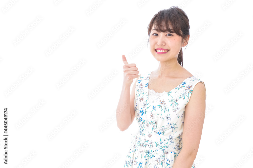 グッドサインをする若い女性 グッドサインをする若い女性