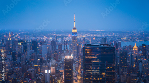 New York City Skyline with Urban Skyscrapers at Night Aerial View