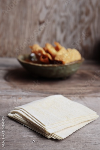 Fried dumpling Chinese food on wood table background