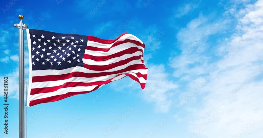 The national flag of the United States of America waving in the wind.