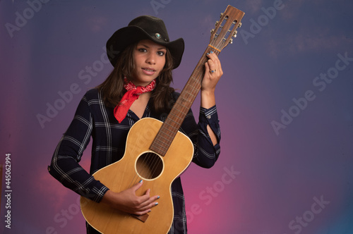 Hispanic girl with guitar