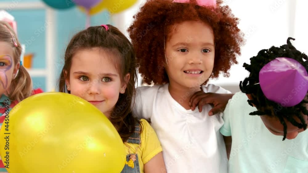 Animation of red shapes over children at birthday party Animation of red shapes over children at birthday party