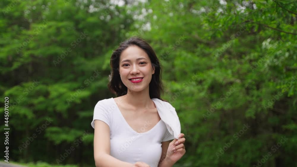 4k slow motion pretty young asian girl walking in the spring park enjoy the nature beautiful day lovely attractive young lady relax outdoor 4k slow motion pretty young asian girl walking in the spring park enjoy the nature beautiful day lovely attractive young lady relax outdoor